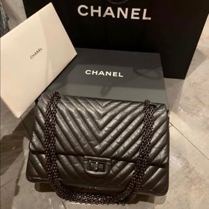Chanel 5.5 with shiny black chain